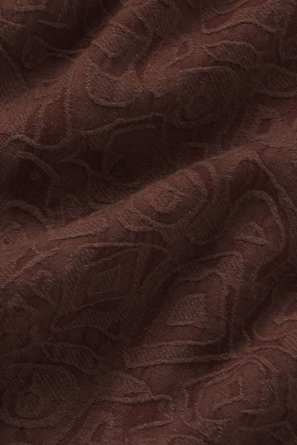 Brown jacquard fabric with textured woven pattern and subtle sheen.