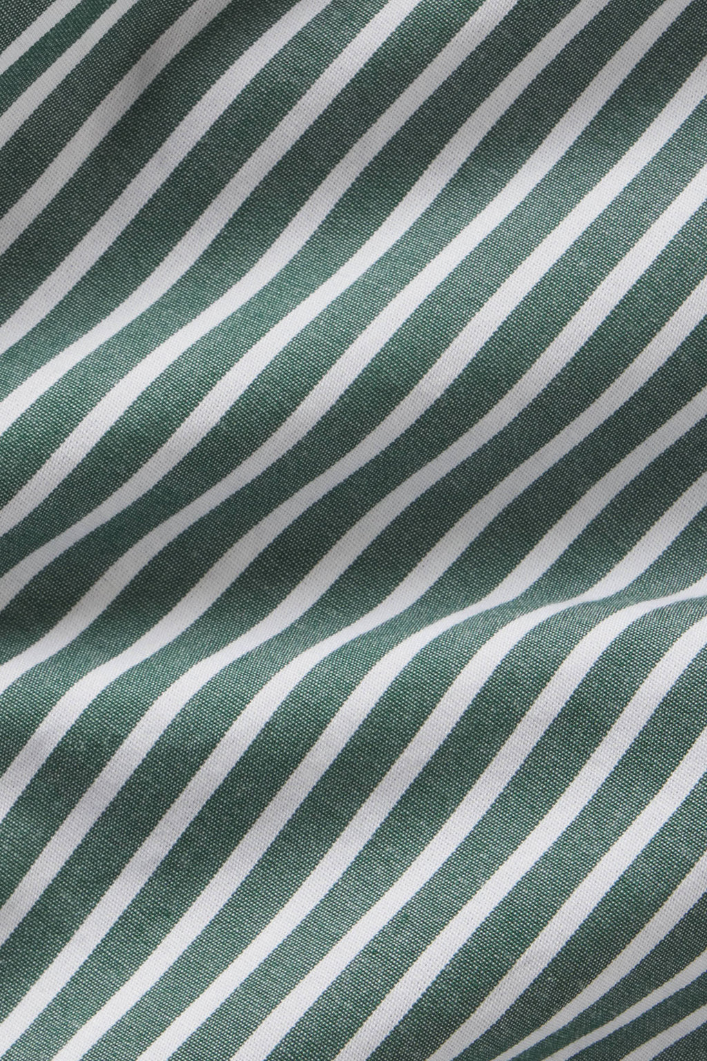 Hunter green and white diagonal striped fabric with textured weave pattern.