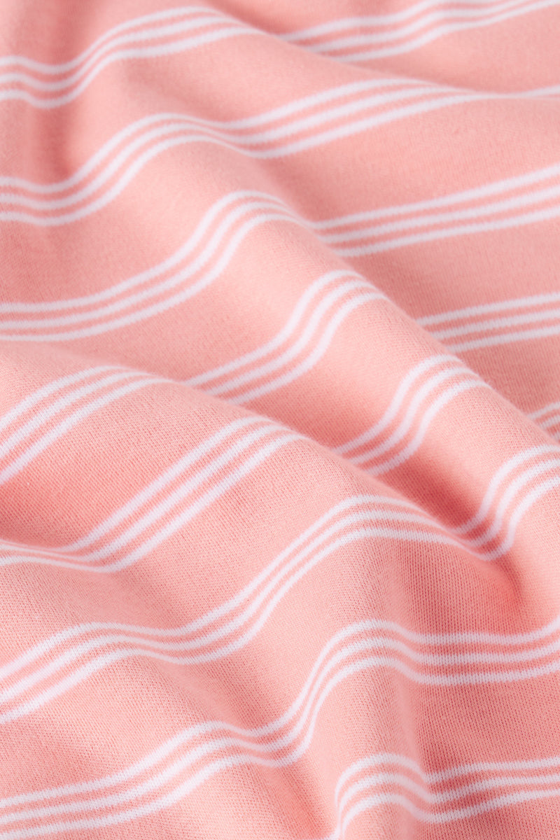 Coral and white striped Pima cotton fabric with a textured, ribbed weave detail.